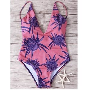 Tropical pink low cut one piece bathing suit